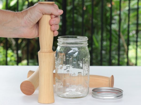 Tool for packing fermented foods into jars.